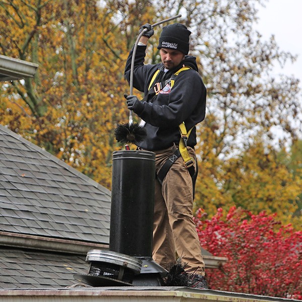 What Exactly Does a Chimney Sweep Involve?